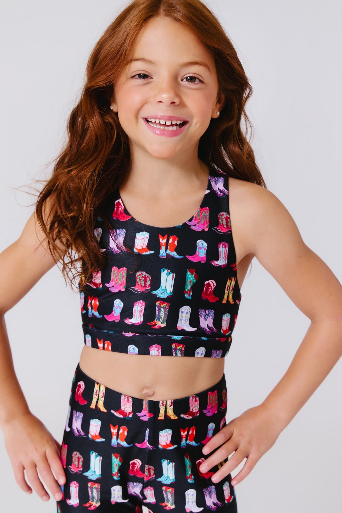 Terez Girls Hi-Shine Sports Bra in Cowgirl Boots on Black on model