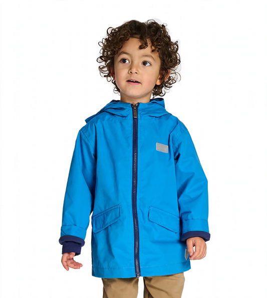 Boy wearing a bright blue hooded rain jacket with front zipper, flap pockets, and reflective patch, front view