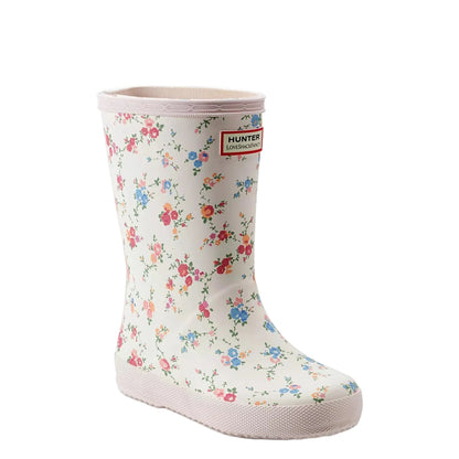 White Hunter x LoveShackFancy Kids' First Classic Rain Boot with a colorful floral pattern and a pink sole.