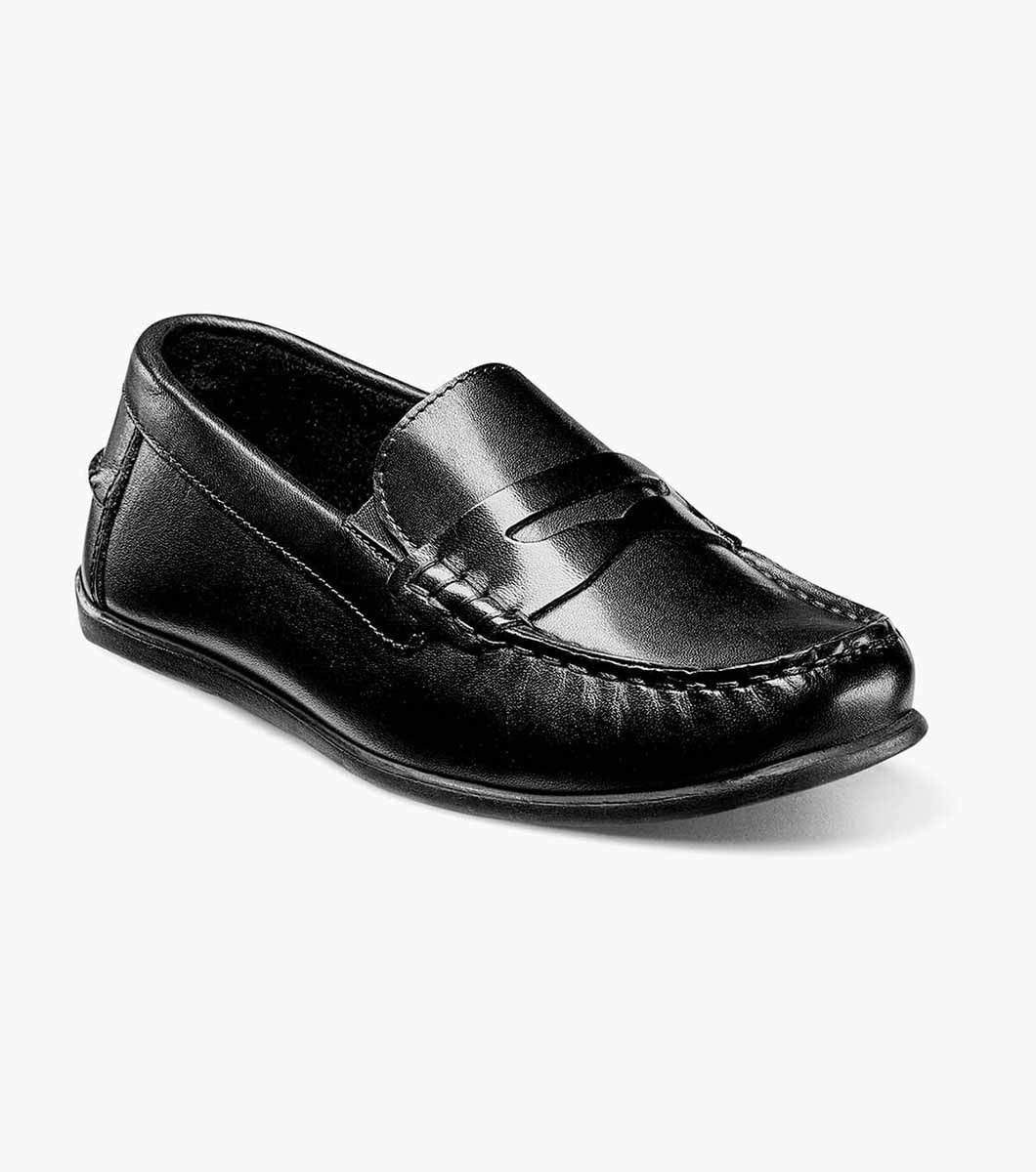 Black leather children's penny loafer with a classic penny strap and moc-toe stitching.