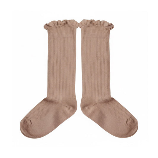 Pair of dusty rose ribbed knee-high socks with a ruffled top edge.