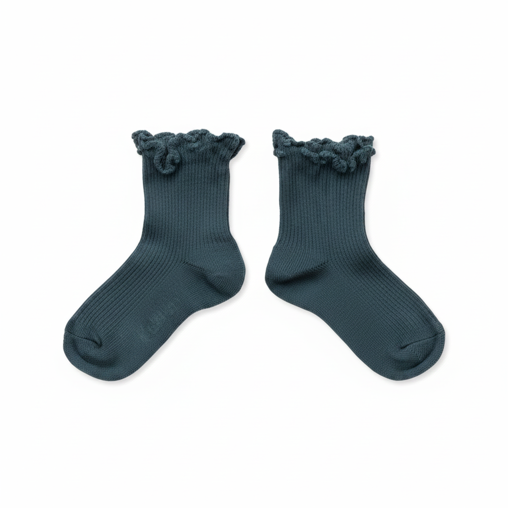 Dark teal ribbed children's Lili socks with ruffled cuffs, shown as a pair.