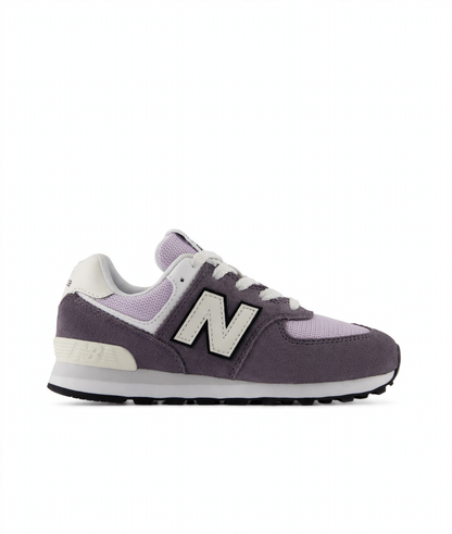 New Balance 574 kids' sneaker in purple suede and lavender mesh with white N logo, laces, and midsole, and black outsole.