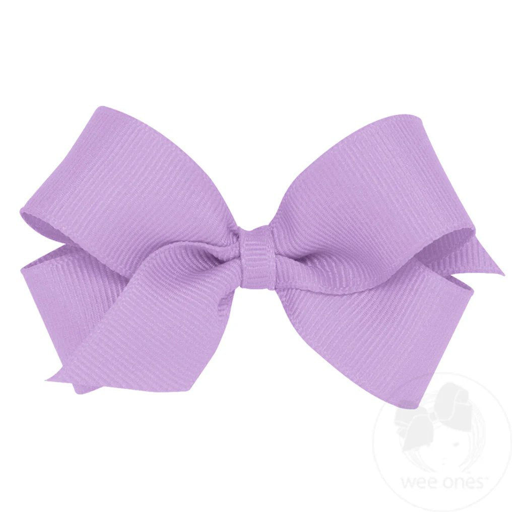 Lavender grosgrain hair bow with a plain wrap center, featuring a ribbed texture and classic bow shape.