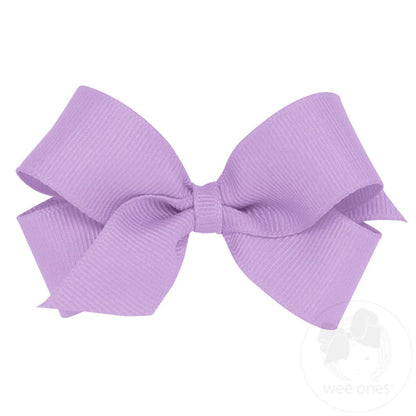 Lavender grosgrain hair bow with a plain wrap center, featuring a ribbed texture and classic bow shape.