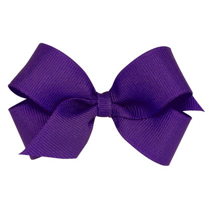 A vibrant purple grosgrain ribbon bow with a ribbed texture, tied neatly in the center.