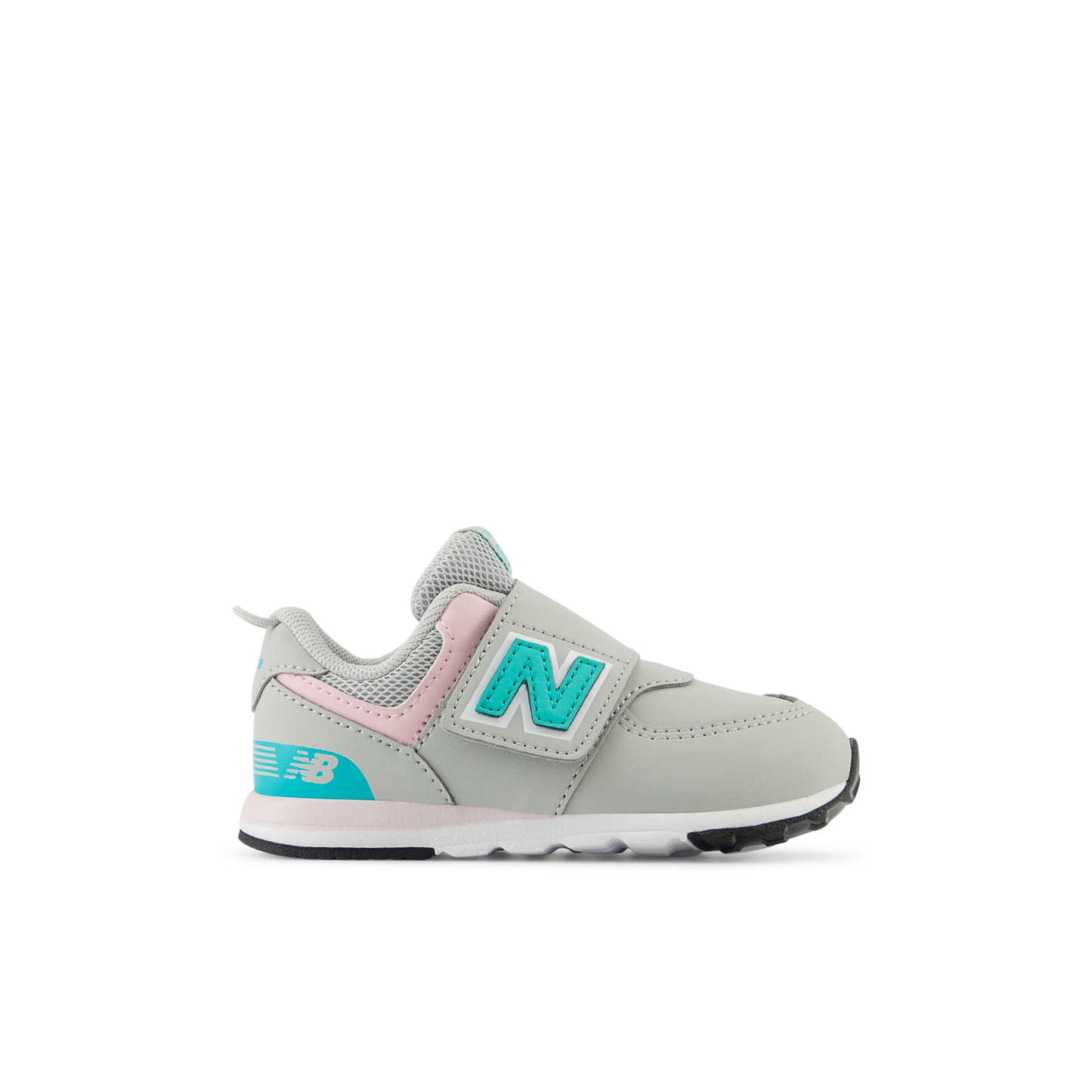 Grey New Balance 574 children's sneaker with pink accents, teal 'N' logo on a hook-and-loop strap, and an 'NB' logo on the heel.