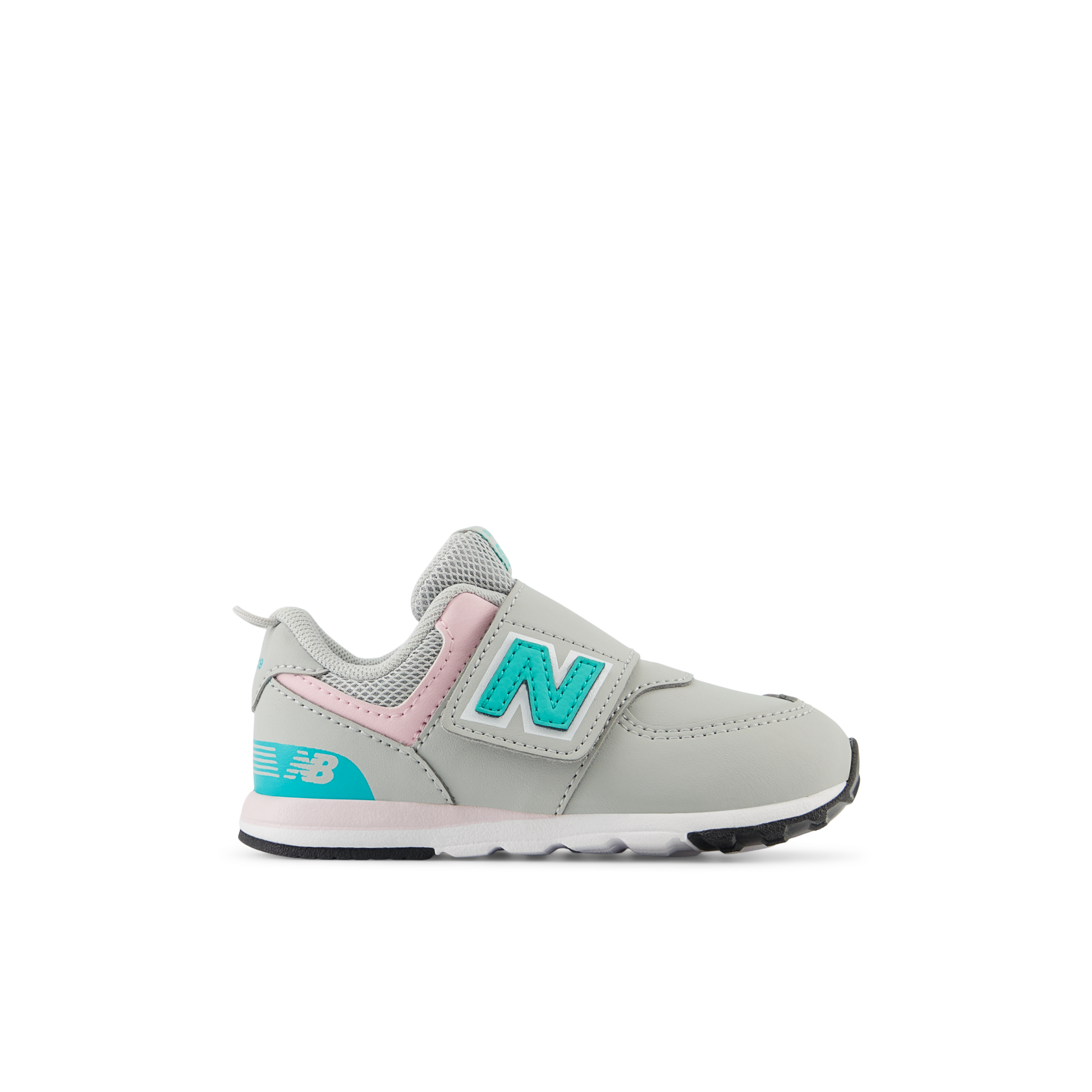 Grey New Balance 574 children's sneaker with pink accents, teal 'N' logo on a hook-and-loop strap, and an 'NB' logo on the heel.