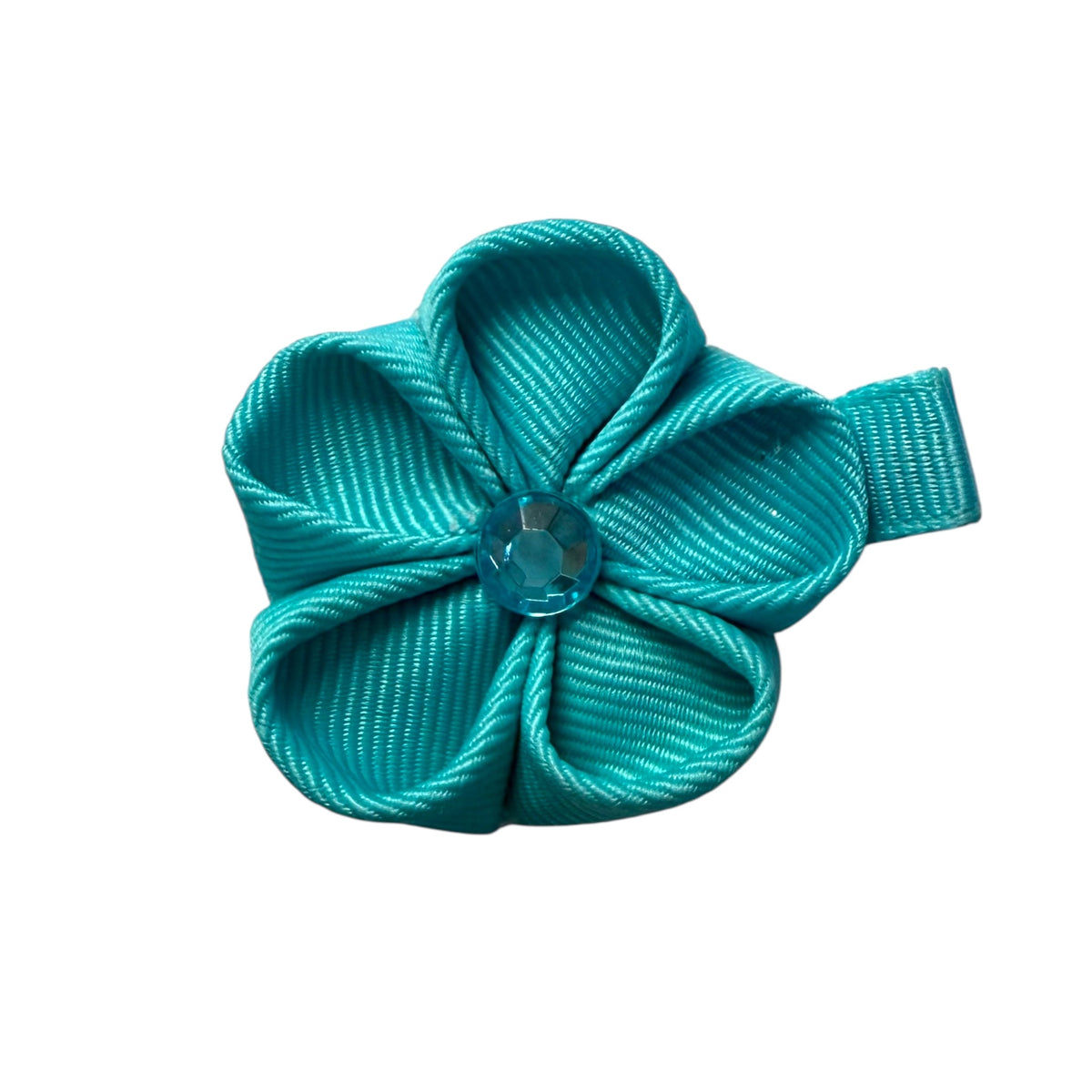 Teal ribbed ribbon flower clip with five petals and a faceted blue gem center.