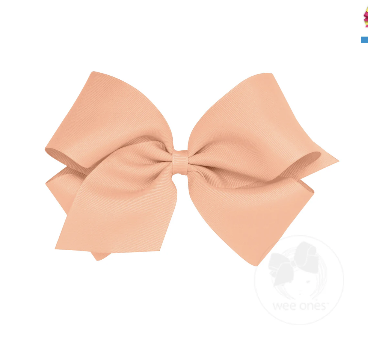Large peach grosgrain hair bow with a classic ribbed texture and symmetrical loops.