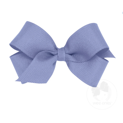 A periwinkle blue mini grosgrain hair bow with a plain wrap center, displayed on a white background.