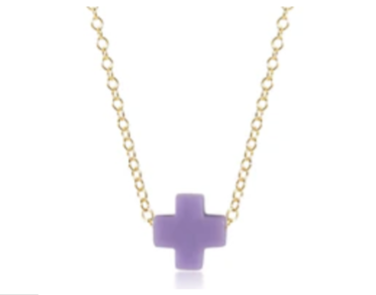 Gold chain necklace with a small, smooth lavender cross pendant.