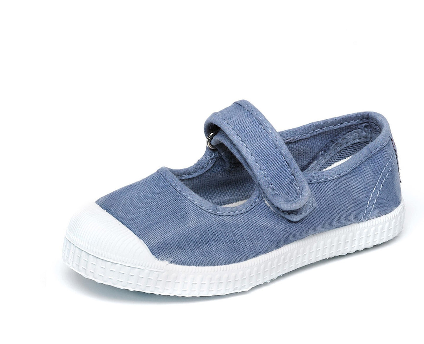 A single blue canvas baby shoe with a hook-and-loop strap and a white rubber toe cap and sole, shown on a white background.