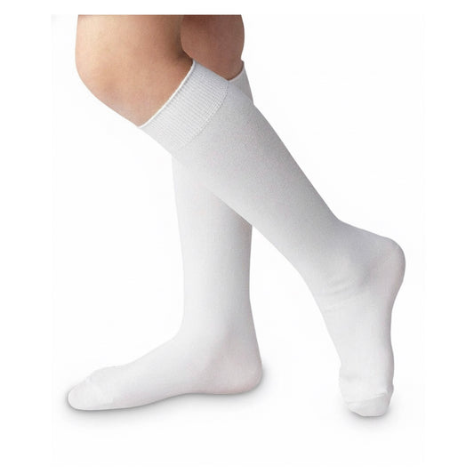 Child's legs wearing plain white knee-high socks with a ribbed cuff, against a white background.