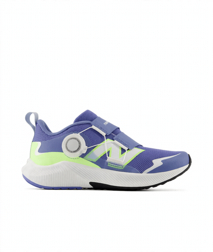 New Balance DynaSoft Reveal v4 BOA children's athletic shoe in purple with lime green accents, featuring a BOA dial and hook-and-loop straps.