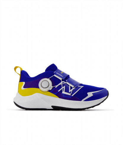 Children's royal blue and yellow athletic shoe with a white sole, black outsole, BOA dial, and hook-and-loop straps.