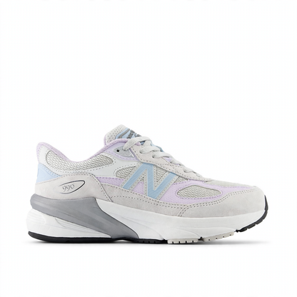 New Balance Fuelcell 990v6 big kids' sneaker in light grey, lavender, and light blue with a white midsole and black outsole.