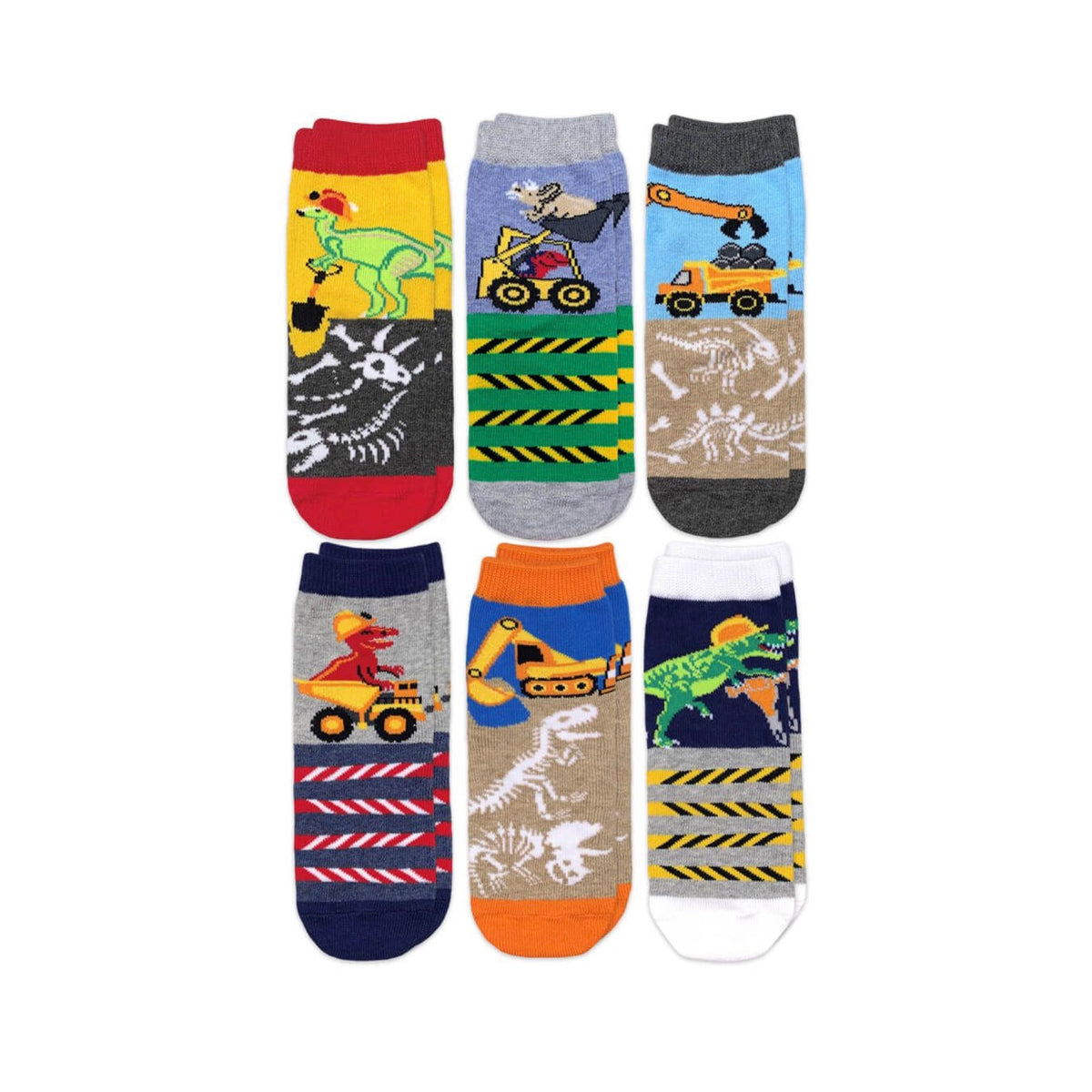 Six pairs of colorful children's crew socks featuring dinosaur and construction vehicle patterns with hazard stripes and fossil designs.