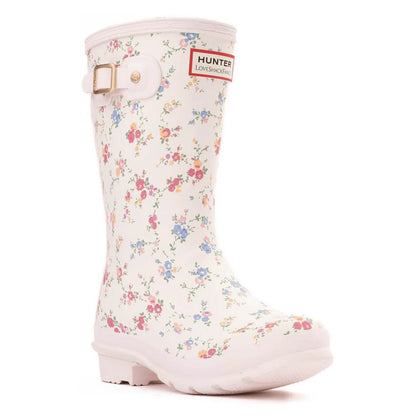 White Hunter x LoveShackFancy kids' rain boot with a delicate multi-colored floral print and a side buckle.