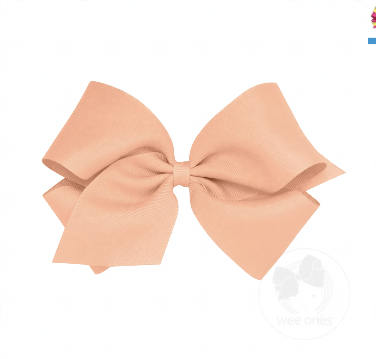 Large peach grosgrain hair bow with a classic ribbed texture and symmetrical loops.