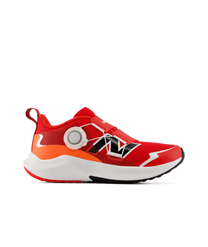 Red and orange New Balance children's athletic shoe with a white sole, black accents, and a side-mounted BOA fit system.