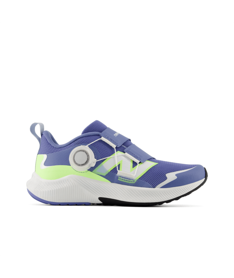 New Balance DynaSoft Reveal v4 BOA children's athletic shoe in purple with lime green accents, featuring a BOA dial and hook-and-loop straps.