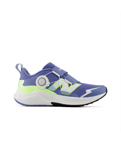New Balance DynaSoft Reveal v4 BOA children's athletic shoe in purple with lime green accents, featuring a BOA dial and hook-and-loop straps.