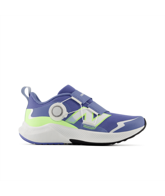 New Balance DynaSoft Reveal v4 BOA children's athletic shoe in purple with lime green accents, featuring a BOA dial and hook-and-loop straps.