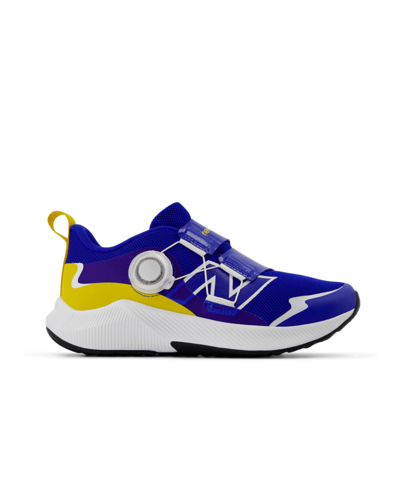 Children's royal blue and yellow athletic shoe with a white sole, black outsole, BOA dial, and hook-and-loop straps.
