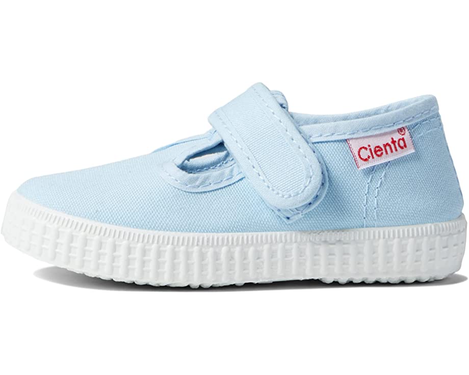 Light blue canvas children's T-strap shoe with a white textured rubber sole and a Velcro strap, featuring a red Cienta brand tag.