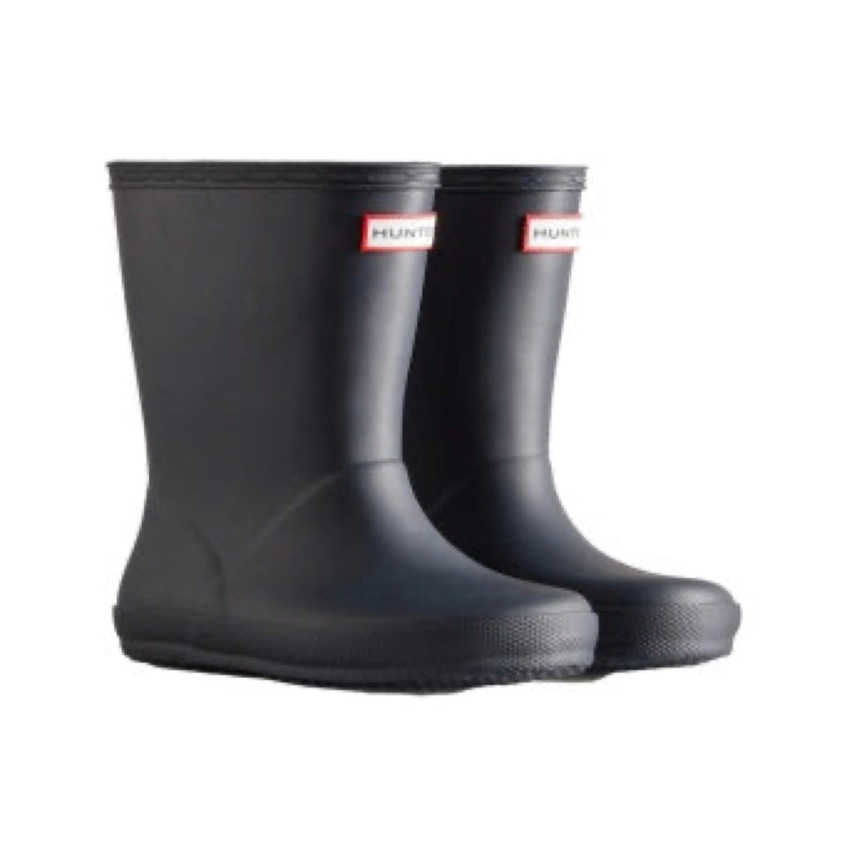 Pair of matte navy blue Hunter First Classic children's rain boots with red logo patches on the front.