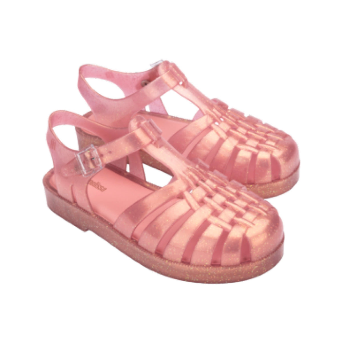 Pair of shiny pink glitter translucent jelly sandals with woven toe and ankle strap.