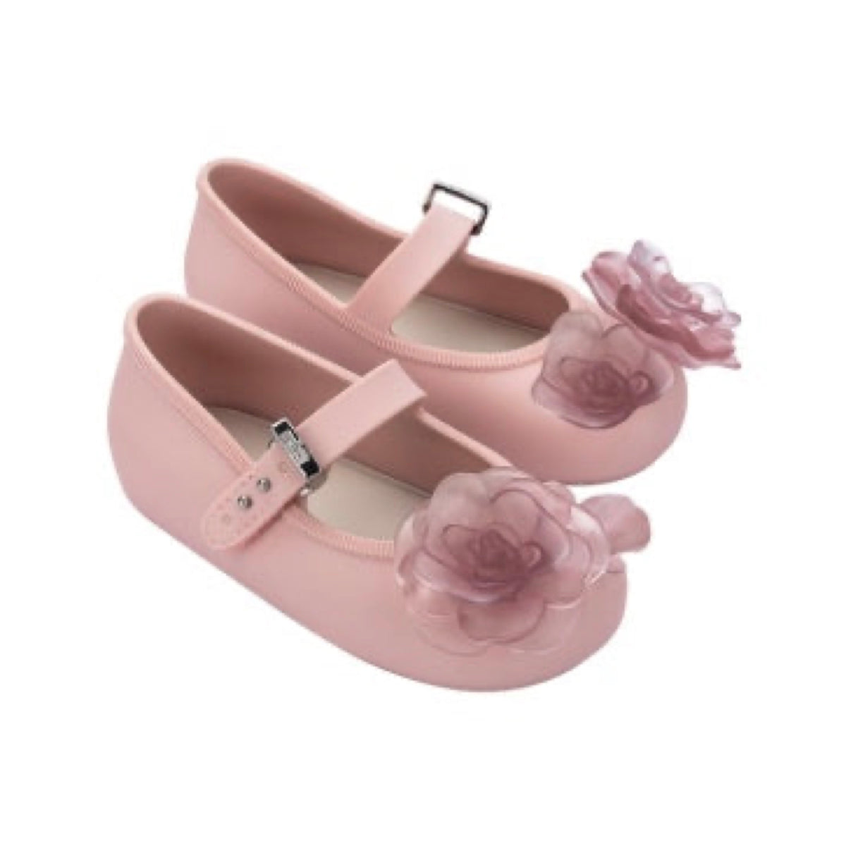 Pair of light pink baby ballerina shoes with a clear pink floral embellishment on the toe and a silver buckle strap.