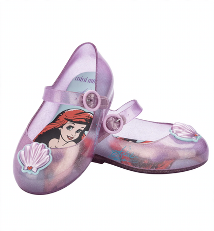 Glittery translucent purple Mini Melissa Mary Jane shoes featuring Ariel on the insole and seashell embellishments on the toes.