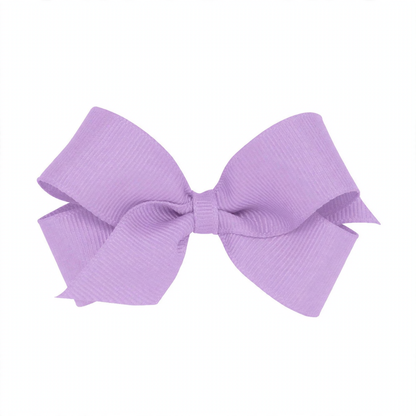 Lavender grosgrain hair bow with a plain wrap center, featuring a ribbed texture and classic bow shape.
