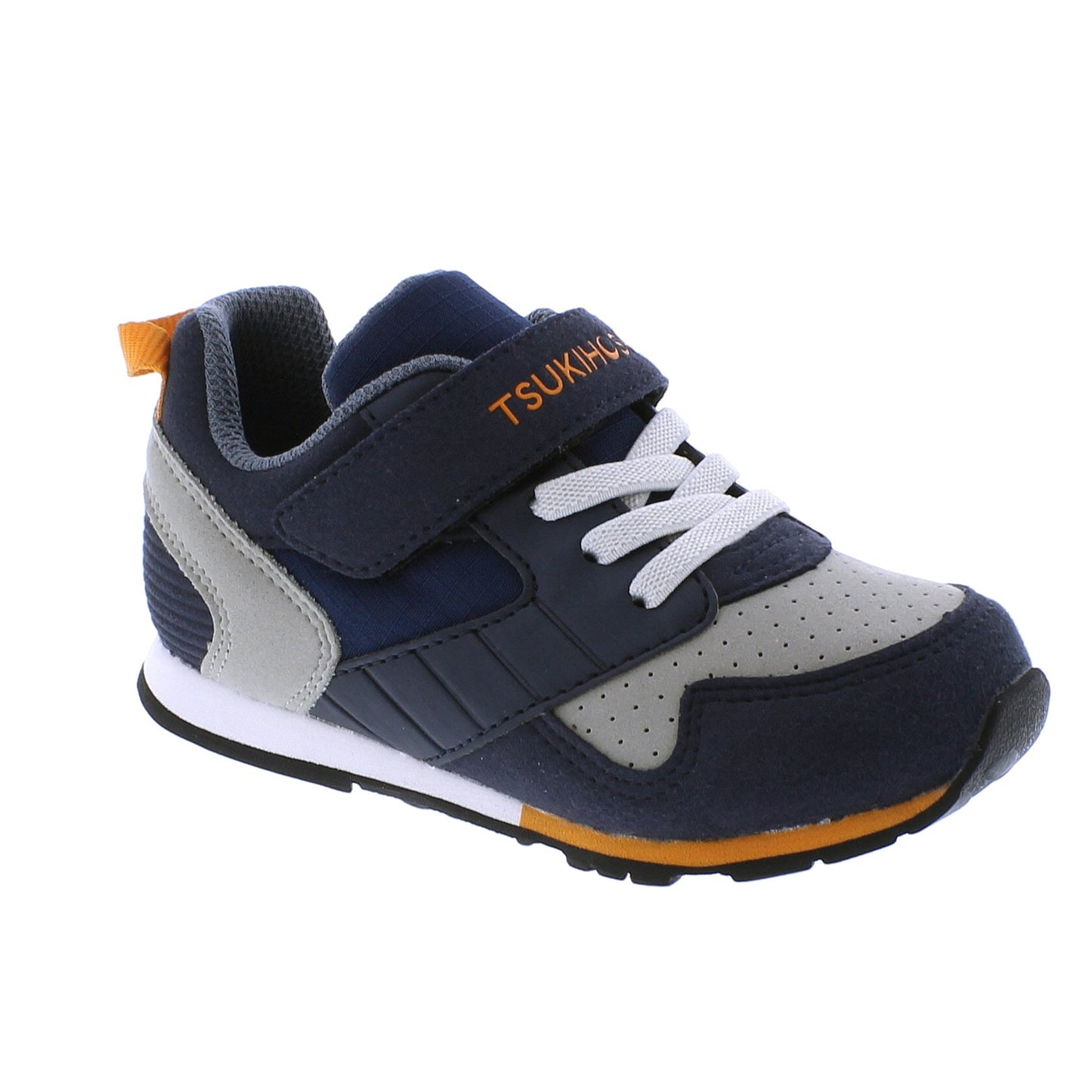 Children's navy blue and grey athletic shoe with white laces, an orange Tsukihoshi Velcro strap, and an orange heel pull tab.