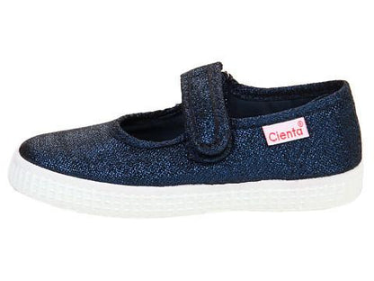 Sparkly dark blue children's Mary Jane style shoe with a single velcro strap and a white textured sole, featuring a pink Cienta label.