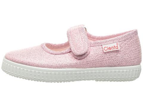 Sparkly pink Cienta Mary Jane style shoe with a hook-and-loop strap and white rubber sole, viewed from the side.