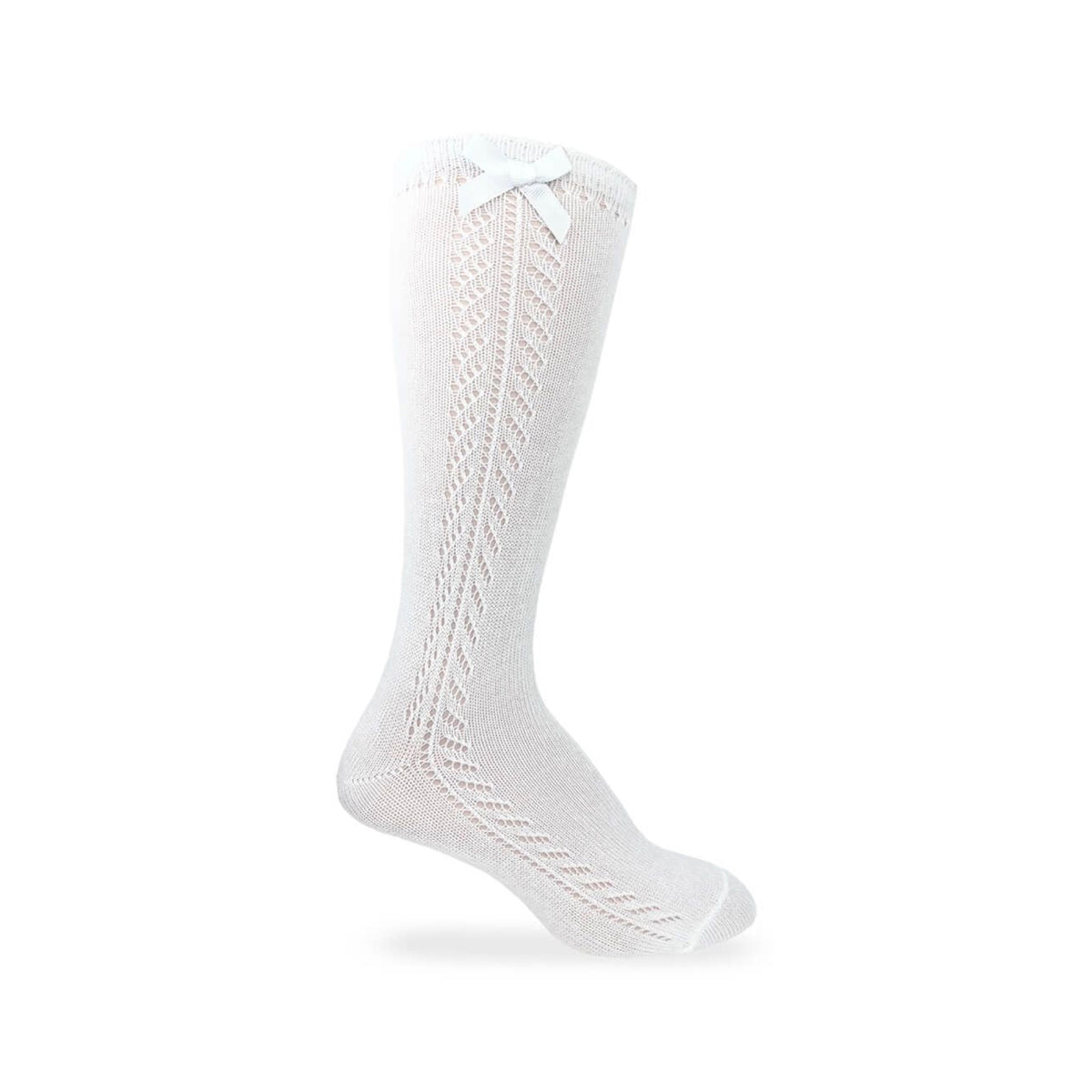 White children's knee-high socks featuring a pointelle knit pattern and a small white bow at the cuff.