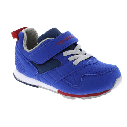 Tsukihoshi Racer Child blue athletic shoe with red pull tab, grey lining, elastic laces, and a Velcro strap with the Tsukihoshi logo.