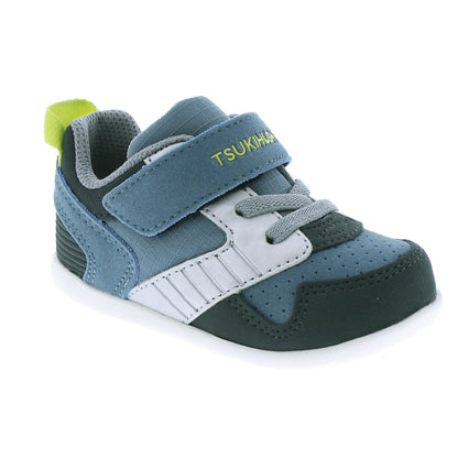 Children's blue and gray sneaker with a lime green pull tab, a Velcro strap featuring the TSUKIHOSHI logo, and faux laces.