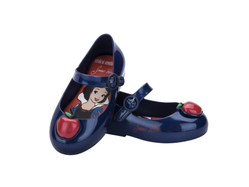 Pair of dark blue Mini Melissa Mary Jane flats for babies, featuring a Snow White insole and a red apple on the toe.