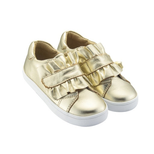 Pair of metallic gold children's sneakers with ruffled velcro straps and white soles.