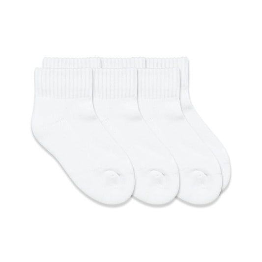 Three pairs of white quarter-length sport socks with ribbed cuffs, laid flat and slightly overlapping.
