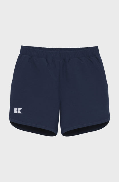 Navy blue athletic shorts with an elastic waistband, side pockets, and a white K-shaped logo on the left leg.