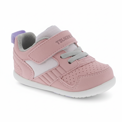 Pink and white children's sneaker with a Velcro strap, gray laces, perforated toe, and a purple heel pull tab.