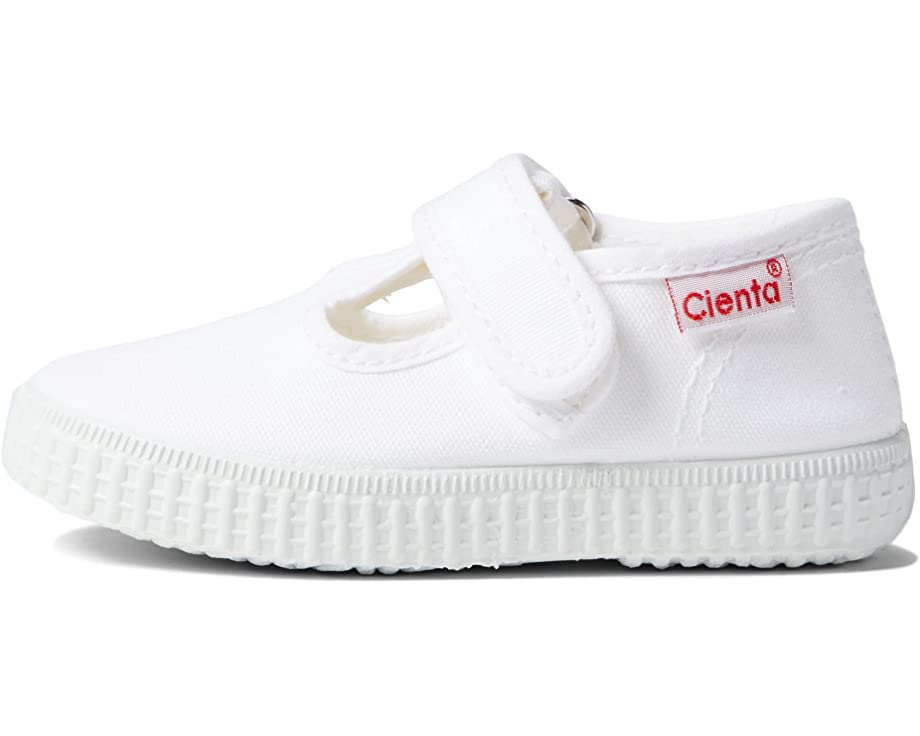 White canvas Cienta Classic T-strap shoe for children, featuring a hook-and-loop closure and a textured white sole.