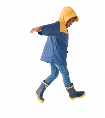 Yellow and navy zip-up rain jacket with a hood, worn by a child, paired with blue jeans and gray rain boots.